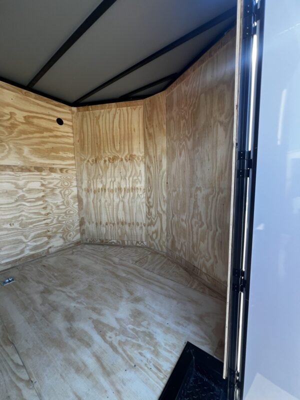 Titanium-8.5C39724-White-Blackout-Spread-axle-Trailer-wfrfr-1.jpg Titanium 8.5×24 White Blackout Spread axle Trailer